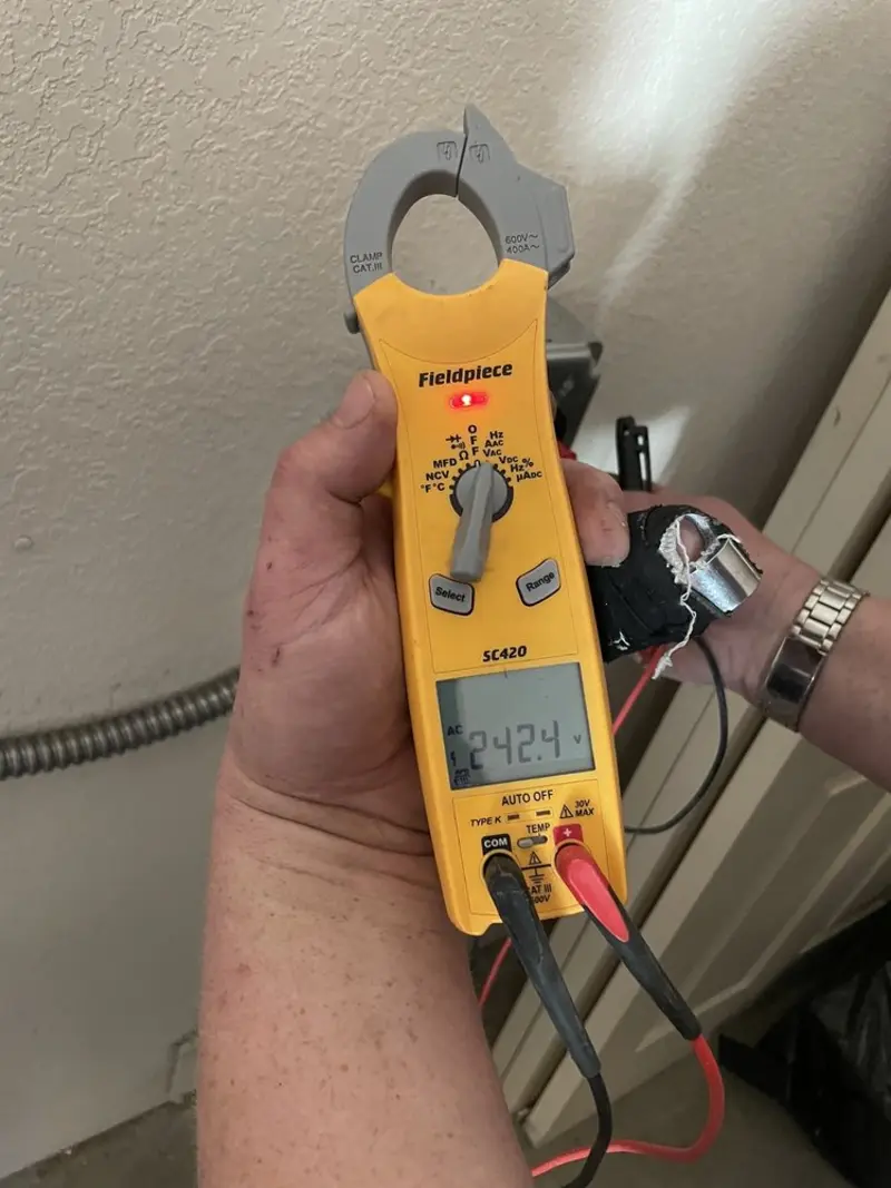 Voltage testing with clamp meter during Generator Installation in Carrollwood